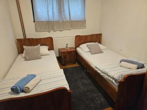 Postelja oz. postelje v sobi nastanitve Apartmani, sobe Žiža