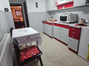 Kuhinja oz. manjša kuhinja v nastanitvi Apartmani, sobe Žiža