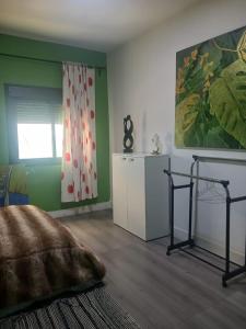 Ένα ή περισσότερα κρεβάτια σε δωμάτιο στο Résidence artistique Vue sur mer