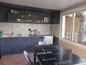 Kuchyň nebo kuchyňský kout v ubytování Apartment Les Claudalies