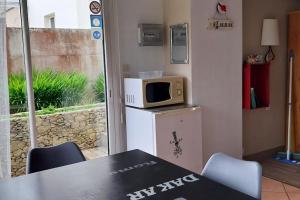 Kuchyň nebo kuchyňský kout v ubytování Apartment Les Claudalies