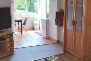 TV a/nebo společenská místnost v ubytování Apartment Les Claudalies