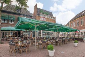 Un restaurante o sitio para comer en Stadshotel Ter Stege