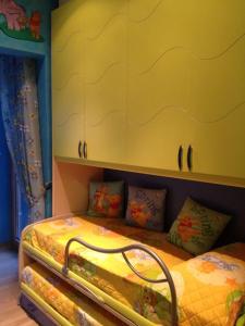 Ένα ή περισσότερα κρεβάτια σε δωμάτιο στο Solemar Apartment