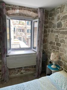Postel nebo postele na pokoji v ubytování Room N&M - Diocletians palace