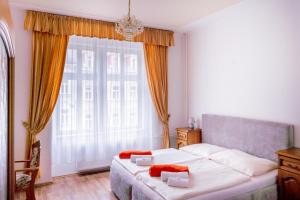 Letto o letti in una camera di Hotel Praga
