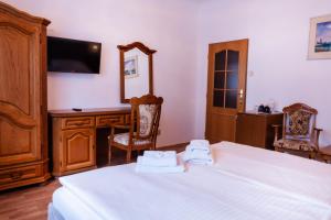 Letto o letti in una camera di Hotel Praga
