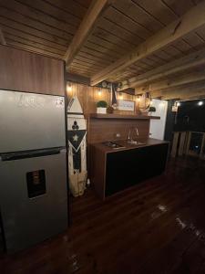 Kuchyň nebo kuchyňský kout v ubytování Neymar Beach House