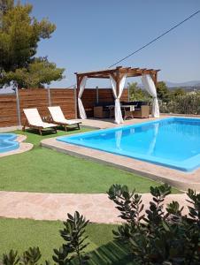 The swimming pool at or close to Villa Red Porto Cheli