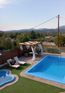 The swimming pool at or close to Villa Red Porto Cheli