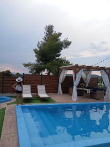 The swimming pool at or close to Villa Red Porto Cheli