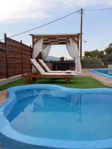 The swimming pool at or close to Villa Red Porto Cheli