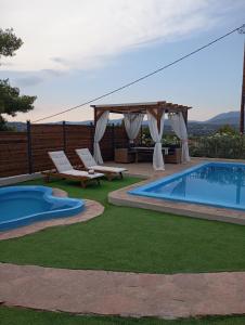 The swimming pool at or close to Villa Red Porto Cheli