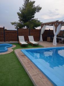 The swimming pool at or close to Villa Red Porto Cheli