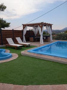 The swimming pool at or close to Villa Red Porto Cheli