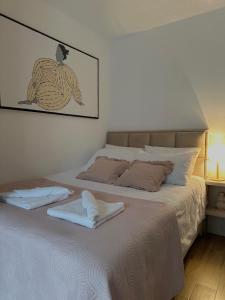 A bed or beds in a room at AS Divcibare
