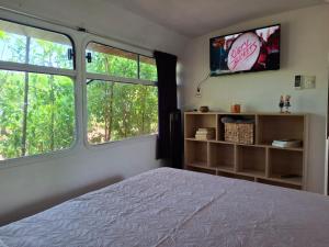 Postel nebo postele na pokoji v ubytování Casa Bus los Guanacastes