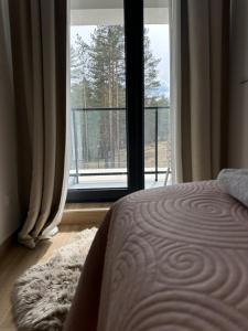 A bed or beds in a room at AS Divcibare