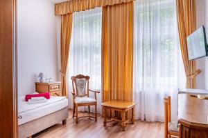 Letto o letti in una camera di Hotel Praga
