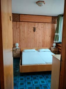 Posteľ alebo postele v izbe v ubytovaní TERRAZZA SULLE DOLOMITI