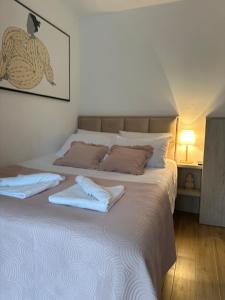 A bed or beds in a room at AS Divcibare