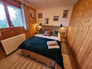 Postel nebo postele na pokoji v ubytování Chalet Perle des Hauts