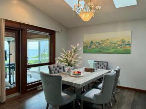a dining room with a table and chairs at Home away on Lake Ontario in Youngstown