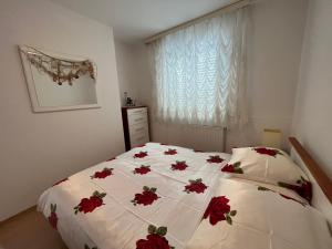 Postel nebo postele na pokoji v ubytování Apartments Villa Slavica