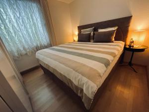Postel nebo postele na pokoji v ubytování Apartments Villa Slavica
