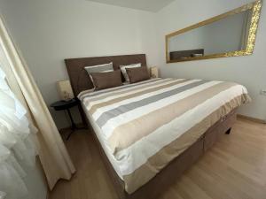 Postel nebo postele na pokoji v ubytování Apartments Villa Slavica