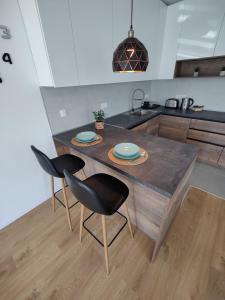 Kuchyň nebo kuchyňský kout v ubytování Sunflower Apartments
