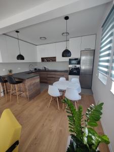 Kuchyň nebo kuchyňský kout v ubytování Sunflower Apartments