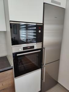 Kuchyň nebo kuchyňský kout v ubytování Sunflower Apartments