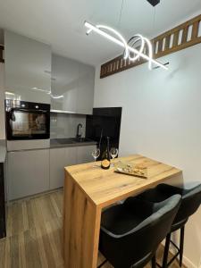 Kuchyň nebo kuchyňský kout v ubytování Apartments Radović