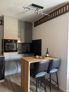 Kuchyň nebo kuchyňský kout v ubytování Apartments Radović