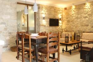 Μια τηλεόραση ή/και κέντρο ψυχαγωγίας στο MangoSeaview Home