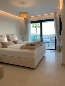 Katil atau katil-katil dalam bilik di Primosten Resort Sunhill Deluxe Apartment Lea +55 gambar