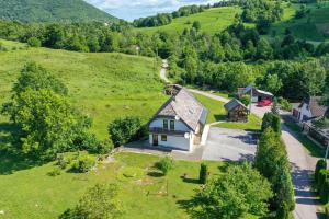 an aerial view of a house on a hill at Apartment & Rooms Luketic in Rastovača