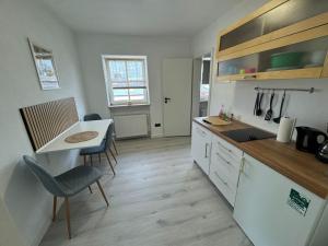 Η κουζίνα ή μικρή κουζίνα στο BOHO Apartment Vintage nähe Salzburg