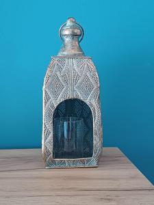 a glass jar sitting on top of a wooden table at VILLA LANA - BLAGAJ in Blagaj +2 photos