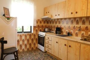 Kuchyň nebo kuchyňský kout v ubytování MangoSeaview Home1