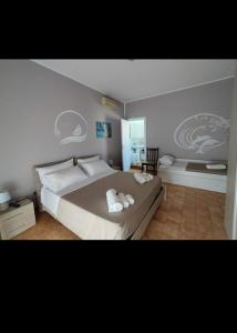 Postel nebo postele na pokoji v ubytování B&B Sansifiro