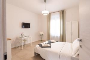 TV a/nebo společenská místnost v ubytování Mentana Guest House