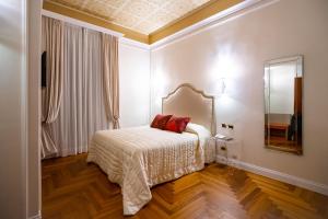 Postel nebo postele na pokoji v ubytování Boutique Hotel Puccini