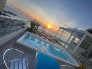Bazén v ubytování Hotel Hernández CTG nebo v jeho okolí