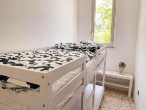 Postel nebo postele na pokoji v ubytování Panoramica Via Villa