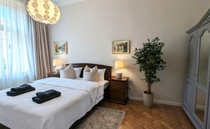 Giường trong phòng chung tại Apartments in Historic Center, Quiet Area, AC