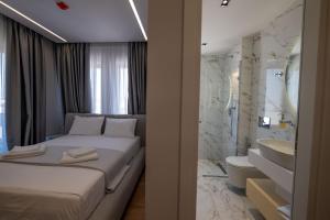 Koupelna v ubytování Norge Hotel