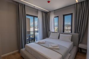 Postel nebo postele na pokoji v ubytování Norge Hotel