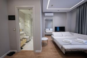 Postel nebo postele na pokoji v ubytování Norge Hotel